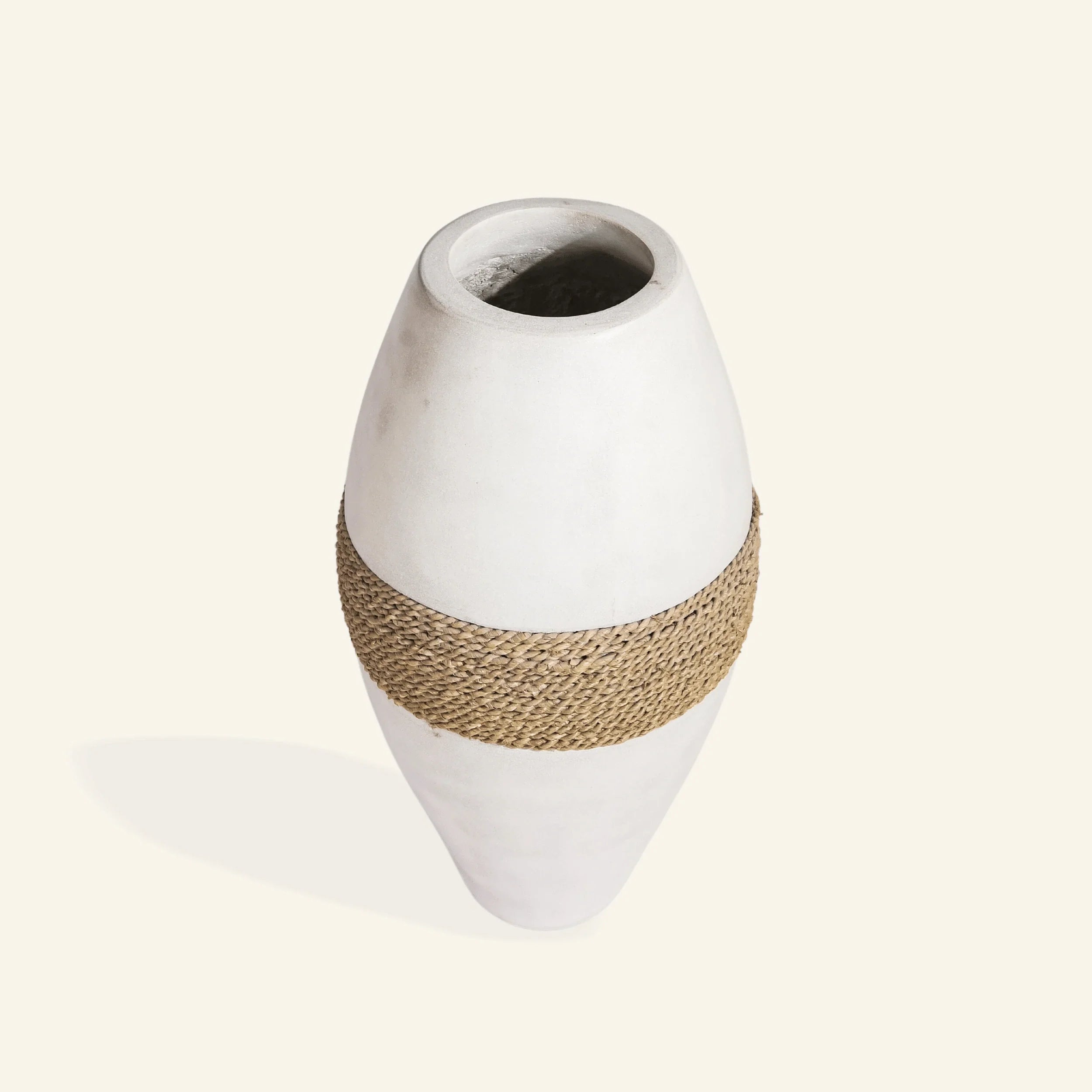 Large decorative vase in cement and seagrass