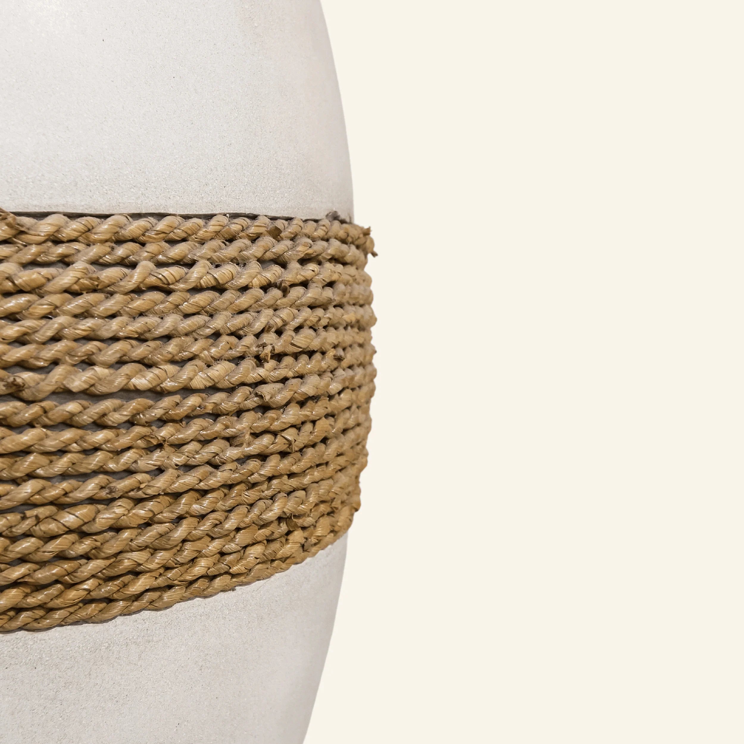 Large decorative vase in cement and seagrass
