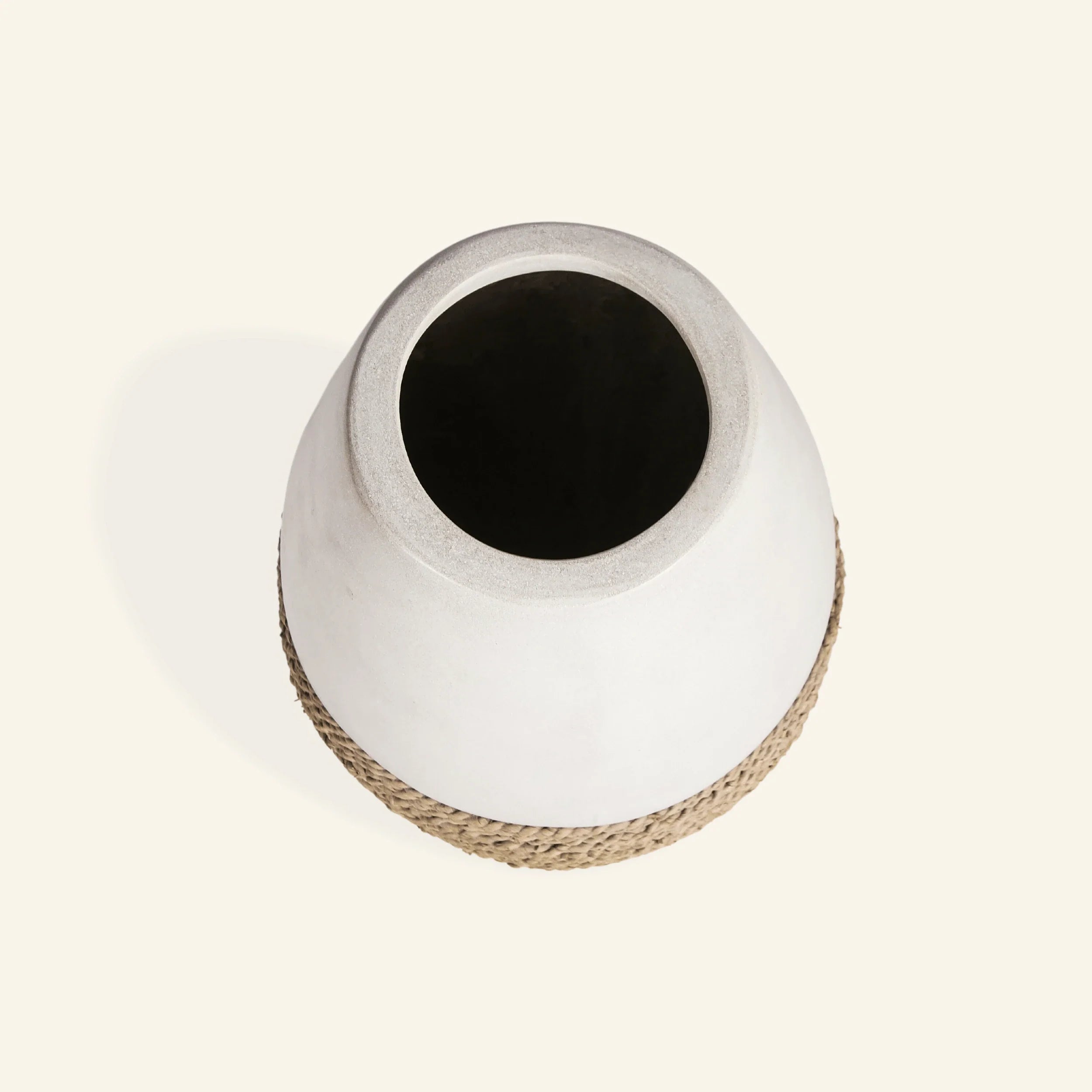 Large decorative vase in cement and seagrass