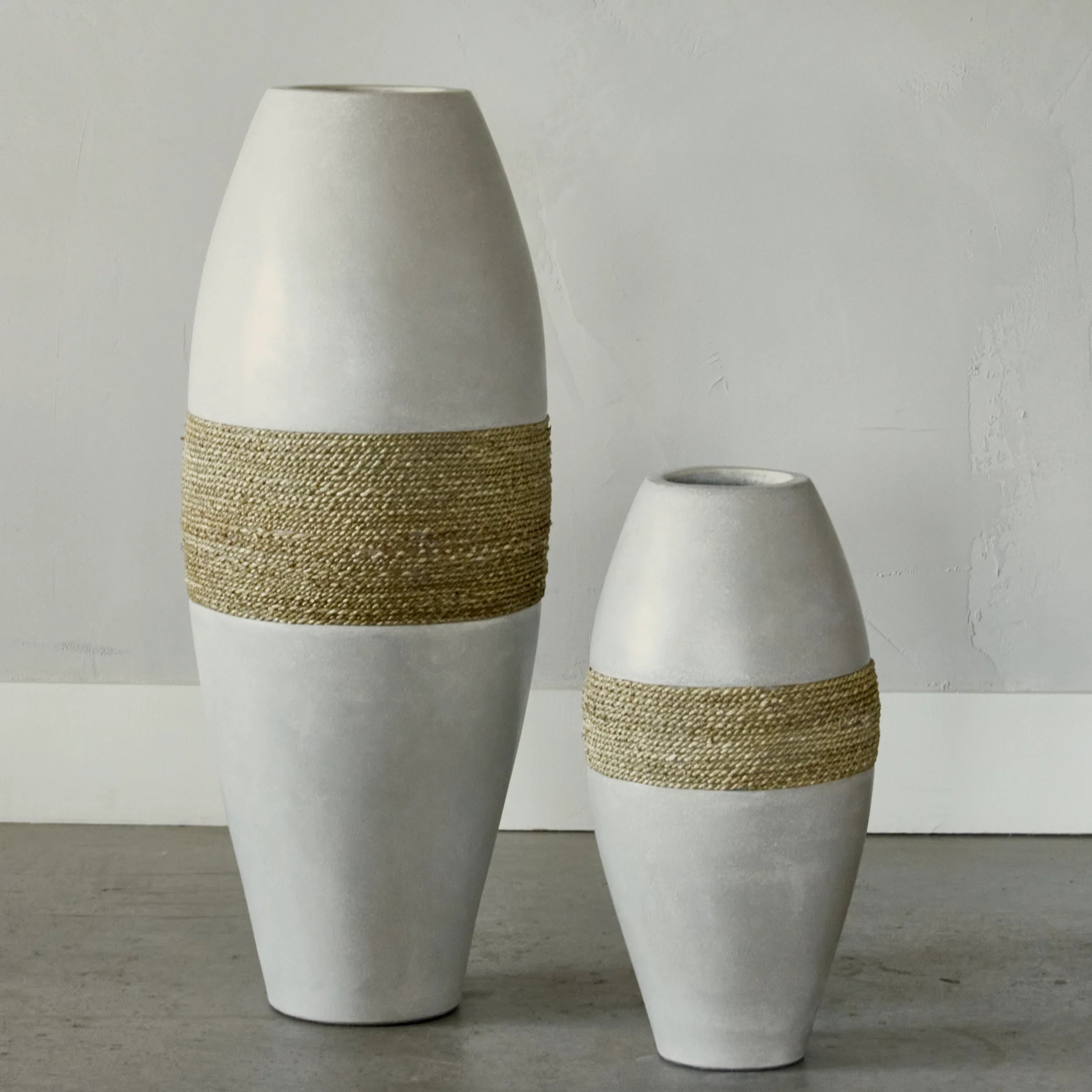 Large decorative vase in cement and seagrass